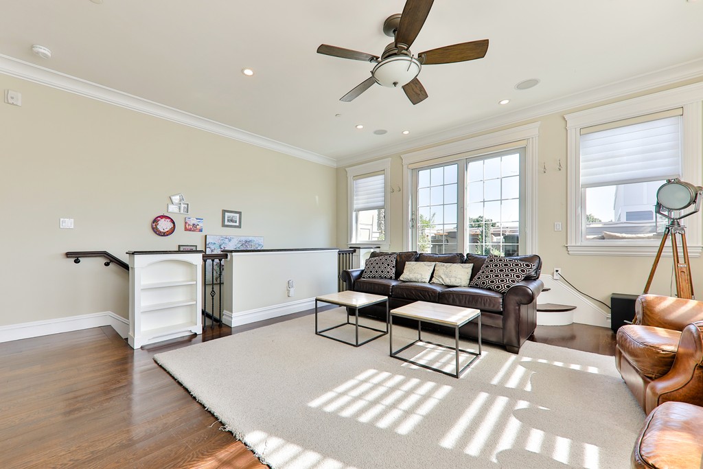 161 Tudor Street, Unit 4 Boston, MA 02127 - Photo 6 of 28 a living room with furniture