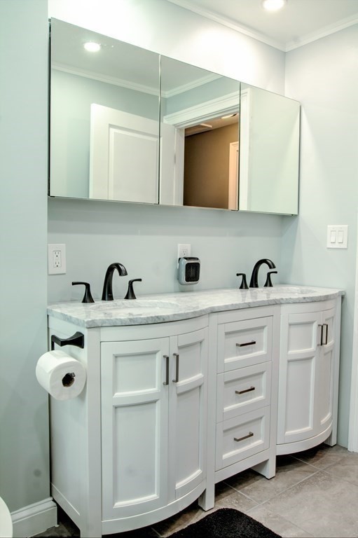 143 North Road Chelmsford, MA 01824 - Photo 20 of 42 a bathroom with a sink and a mirror