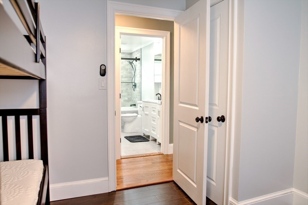 143 North Road Chelmsford, MA 01824 - Photo 24 of 42 a view of a bathroom from a hallway