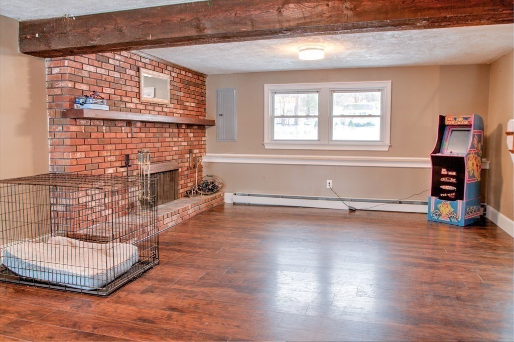 143 North Road Chelmsford, MA 01824 - Photo 25 of 42 a view of a livingroom with wooden floor and furniture