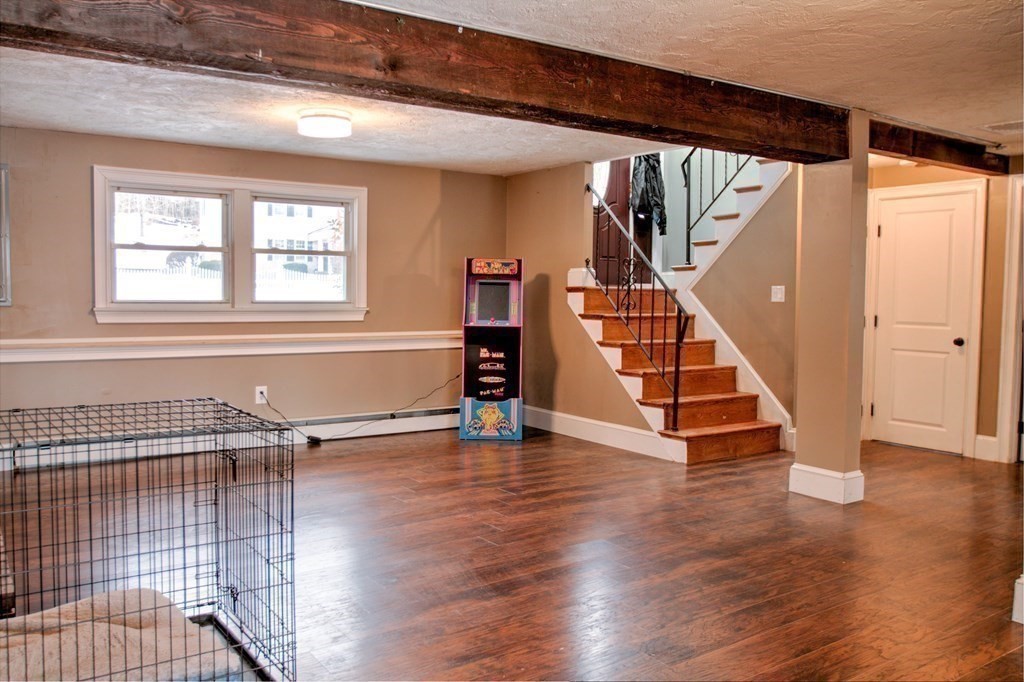 143 North Road Chelmsford, MA 01824 - Photo 28 of 42 a view of an entryway with wooden floor and staircase