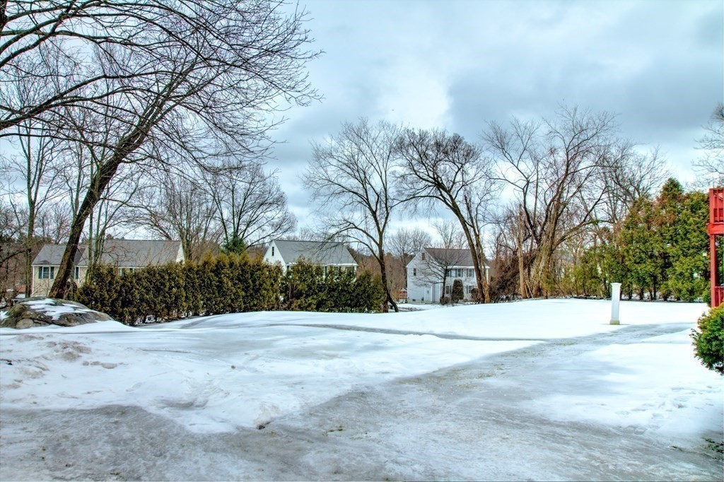 143 North Road Chelmsford, MA 01824 - Photo 37 of 42 a view of white house with a yard