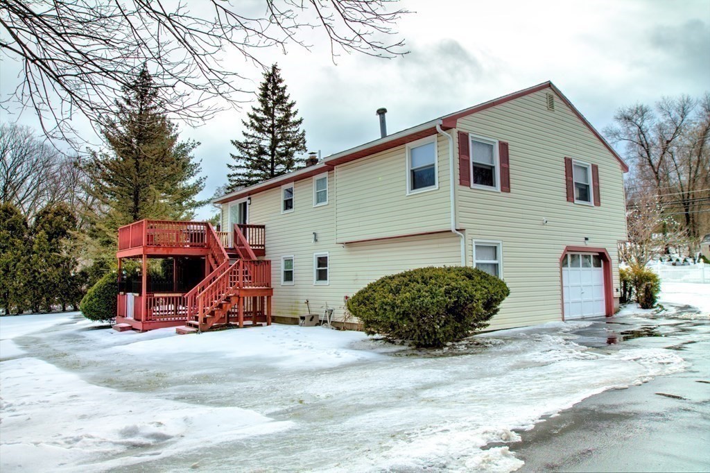 143 North Road Chelmsford, MA 01824 - Photo 41 of 42 a view of a car park in front of house