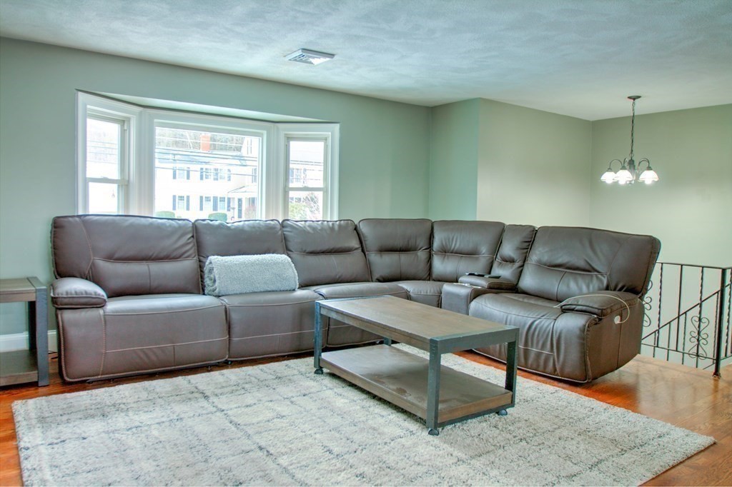 143 North Road Chelmsford, MA 01824 - Photo 9 of 42 a living room with furniture and a window