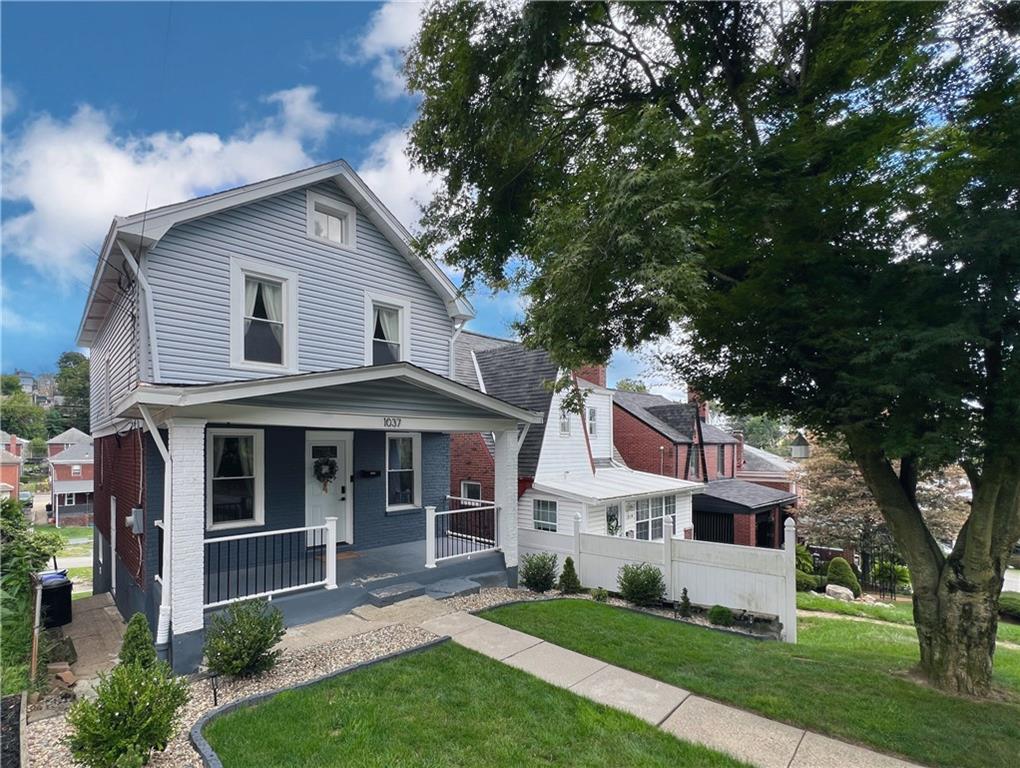 1037 Bay Ridge Avenue Pittsburgh, PA 15226 - Photo 32 of 34 a front view of a house with a yard