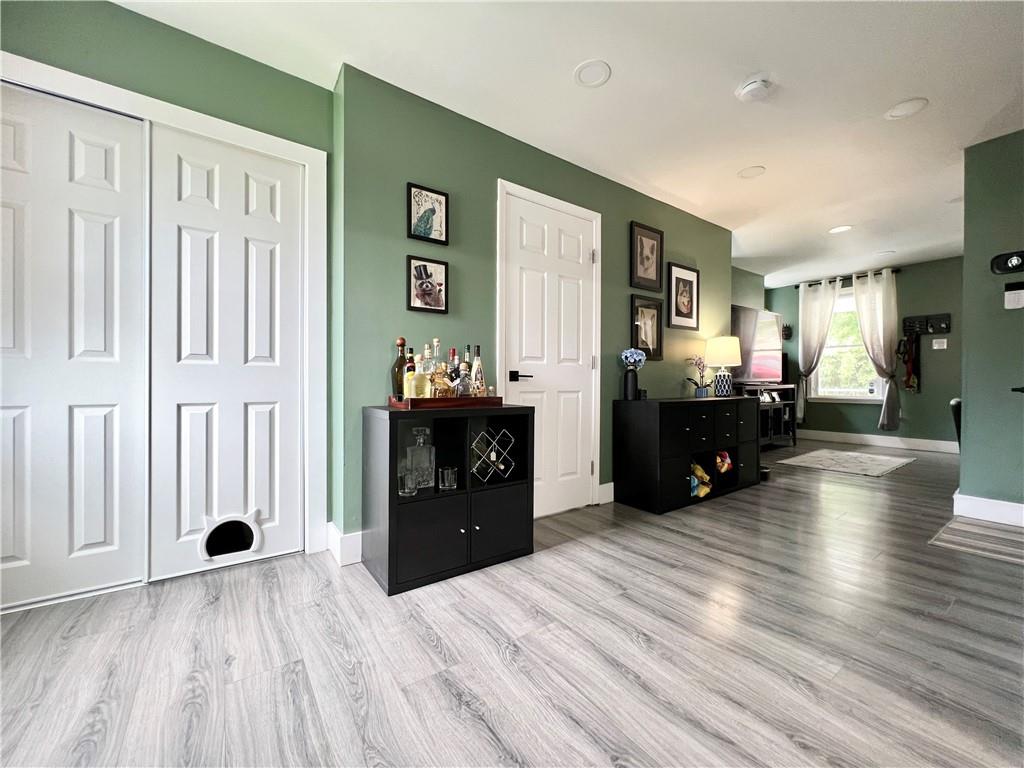 1037 Bay Ridge Avenue Pittsburgh, PA 15226 - Photo 7 of 34 a view of a kitchen with furniture and wooden floor