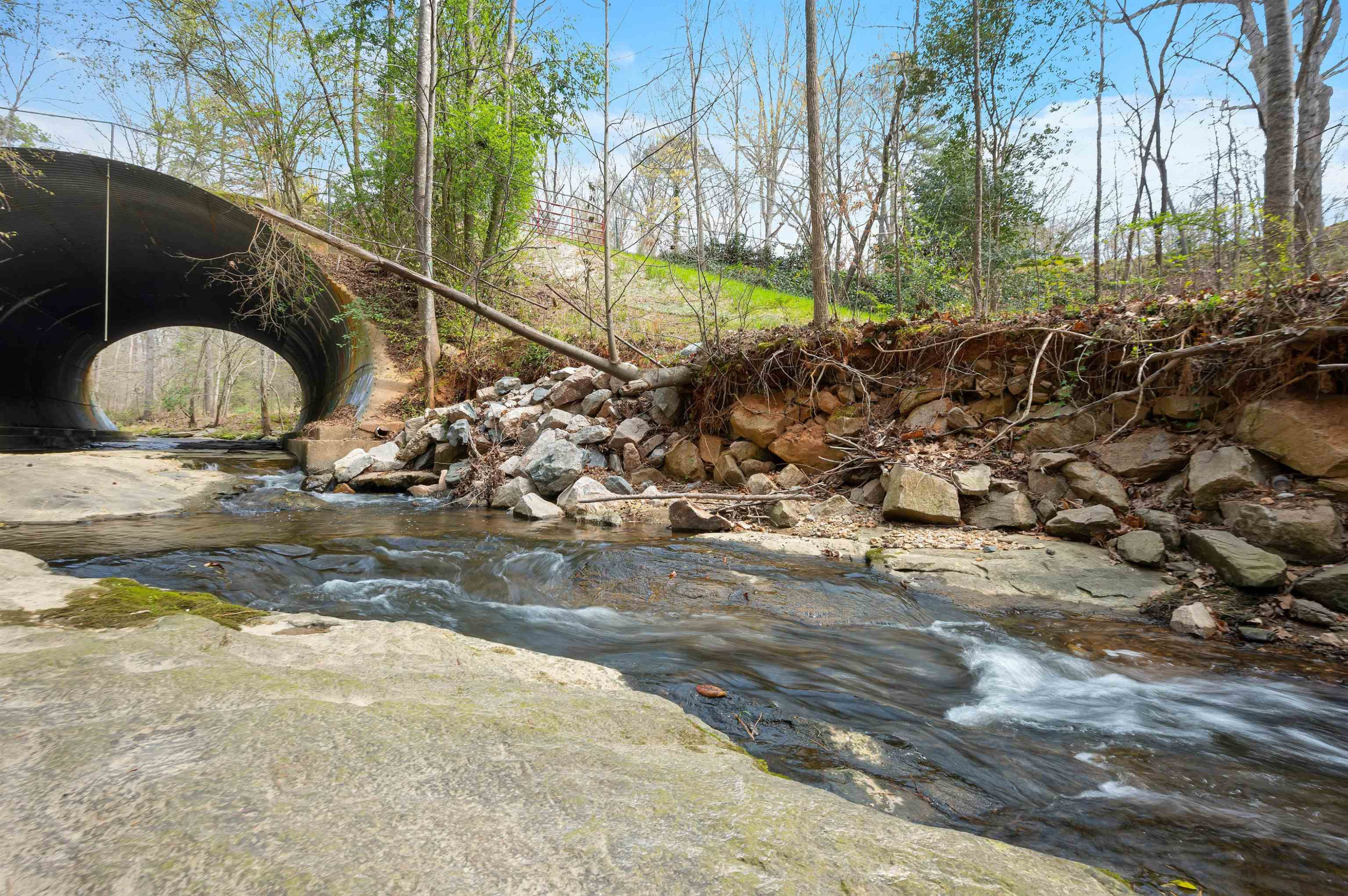 4907 Rembert Drive Raleigh, NC 27612 - Photo 46 of 52 This creek runs along the edge of the property and is quite serene Hare Snipe Creek