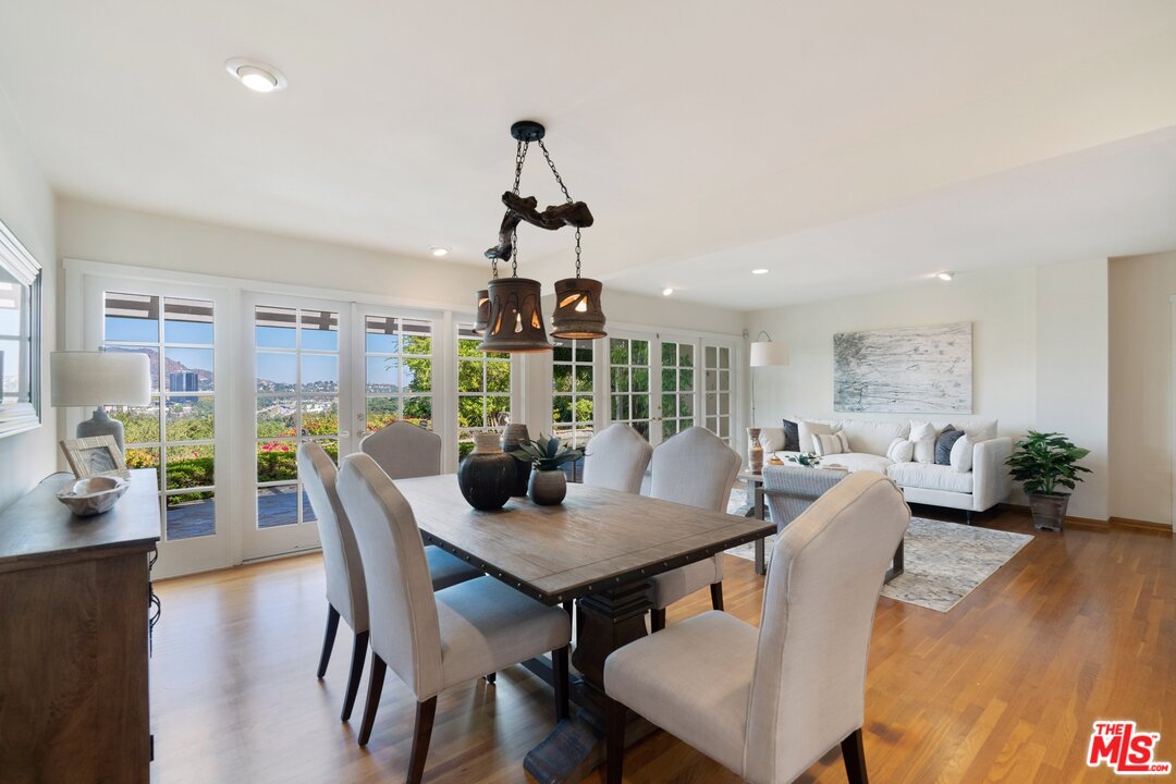 3710 Eureka Drive Studio City, CA 91604 - Photo 12 of 51 a view of a dining room with furniture window and wooden floor