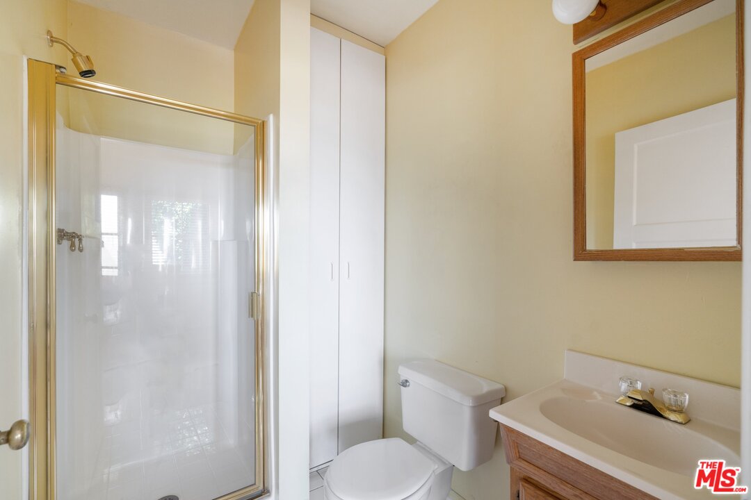 3710 Eureka Drive Studio City, CA 91604 - Photo 33 of 51 a bathroom with a sink and a mirror