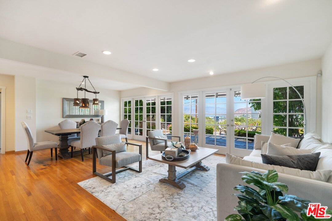3710 Eureka Drive Studio City, CA 91604 - Photo 10 of 51 a living room with furniture and a large window