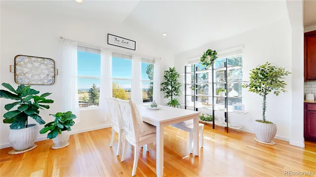 a view of a living room and dining room