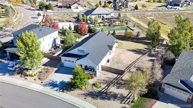 an aerial view of a houses with outdoor space
