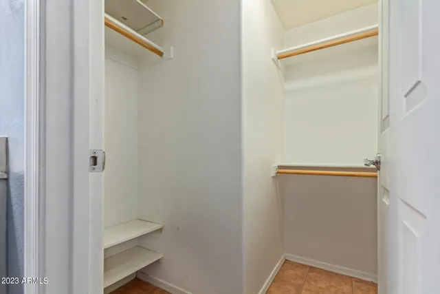 a view of small space with racks on the wall