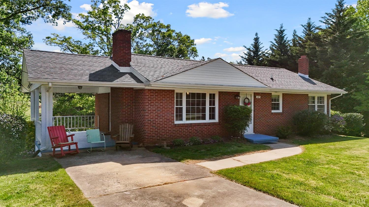 207 Ramsey Road Hurt, VA 24563 - Photo 1 of 32 a front view of a house with garden