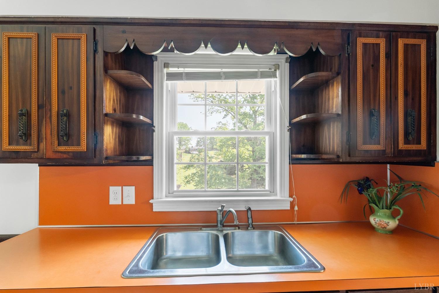 207 Ramsey Road Hurt, VA 24563 - Photo 11 of 32 a kitchen that has a sink and a window