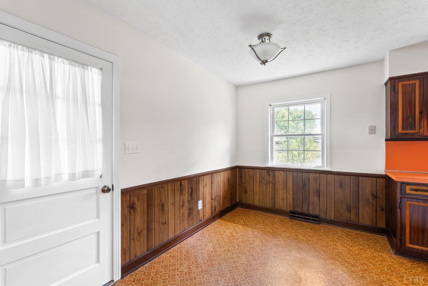 207 Ramsey Road Hurt, VA 24563 - Photo 8 of 32 a view of an empty room with a window