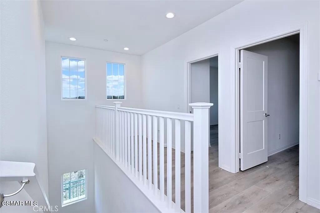 207 Morro Way, Unit 3 Simi Valley, CA 93065 - Photo 9 of 31 a view of a hallway with windows