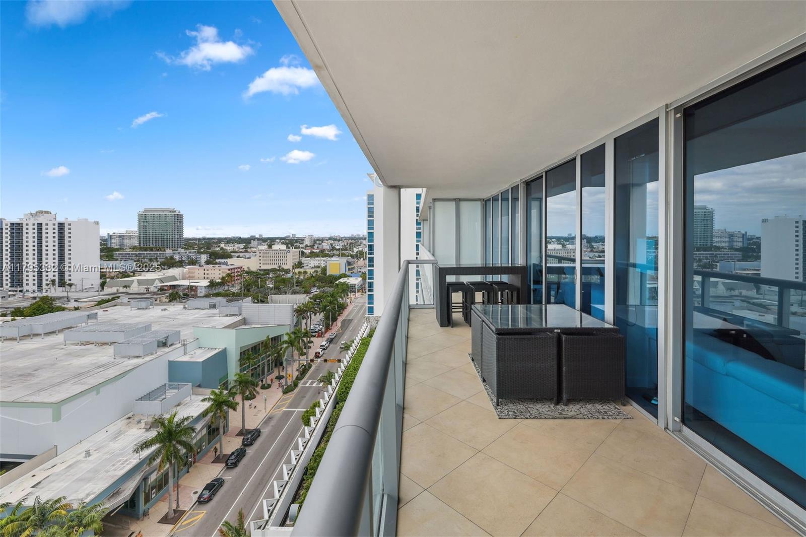 6799 Collins Avenue, Unit 1106 Miami Beach, FL 33141 - Photo 12 of 43 a view of a terrace with seating area