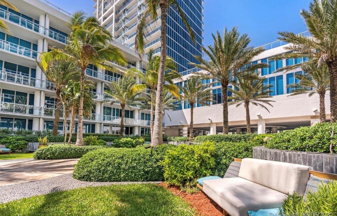 6799 Collins Avenue, Unit 1106 Miami Beach, FL 33141 - Photo 42 of 43 a view of building with yard