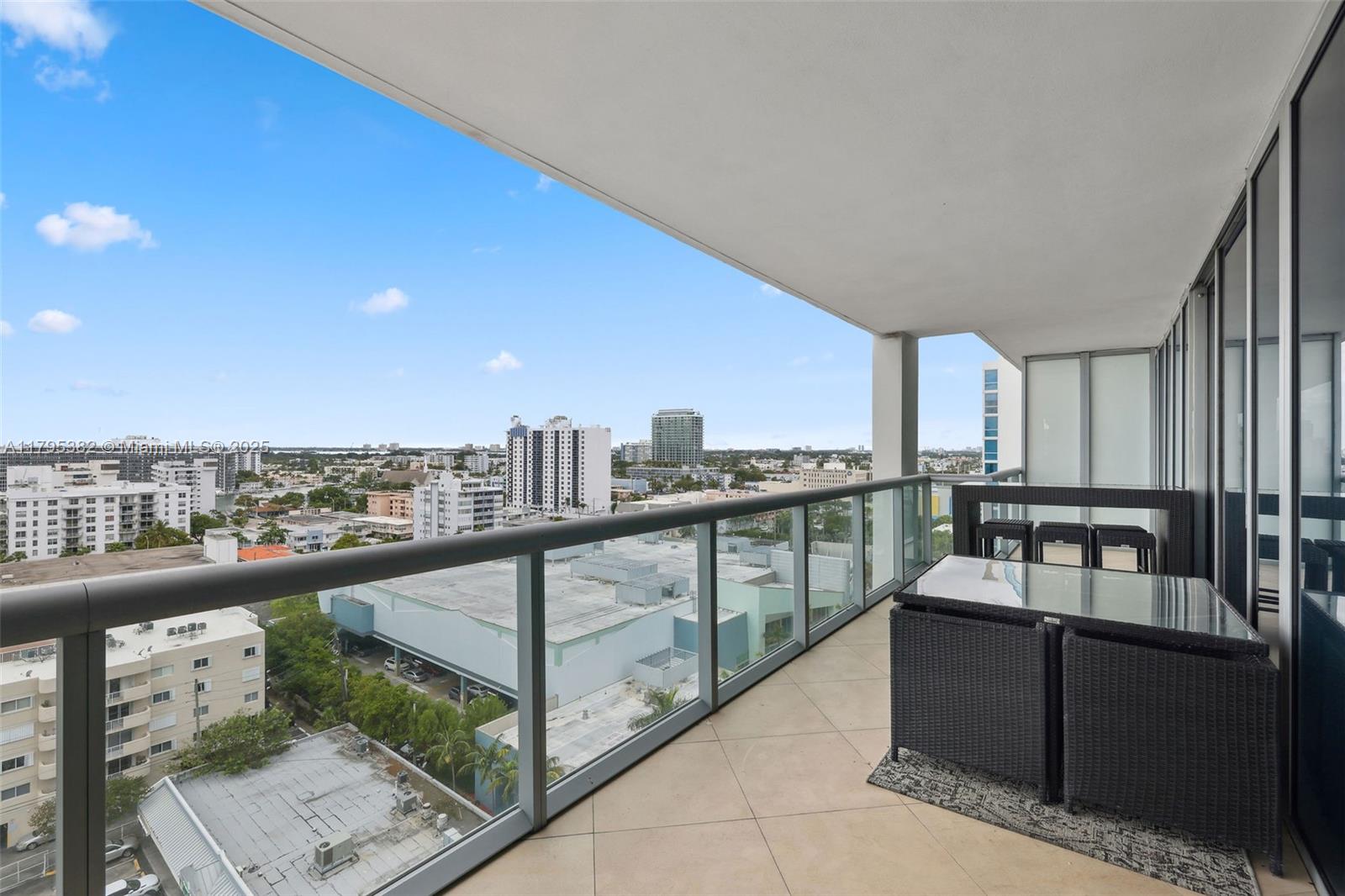 6799 Collins Avenue, Unit 1106 Miami Beach, FL 33141 - Photo 10 of 43 a view of a balcony with city view