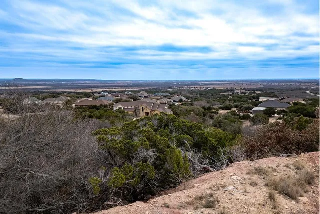 a view of mountain view with mountains in the background