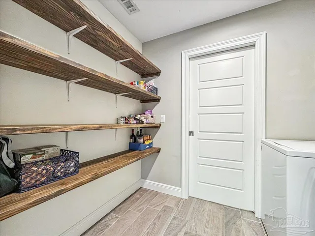 a view of storage and utility room