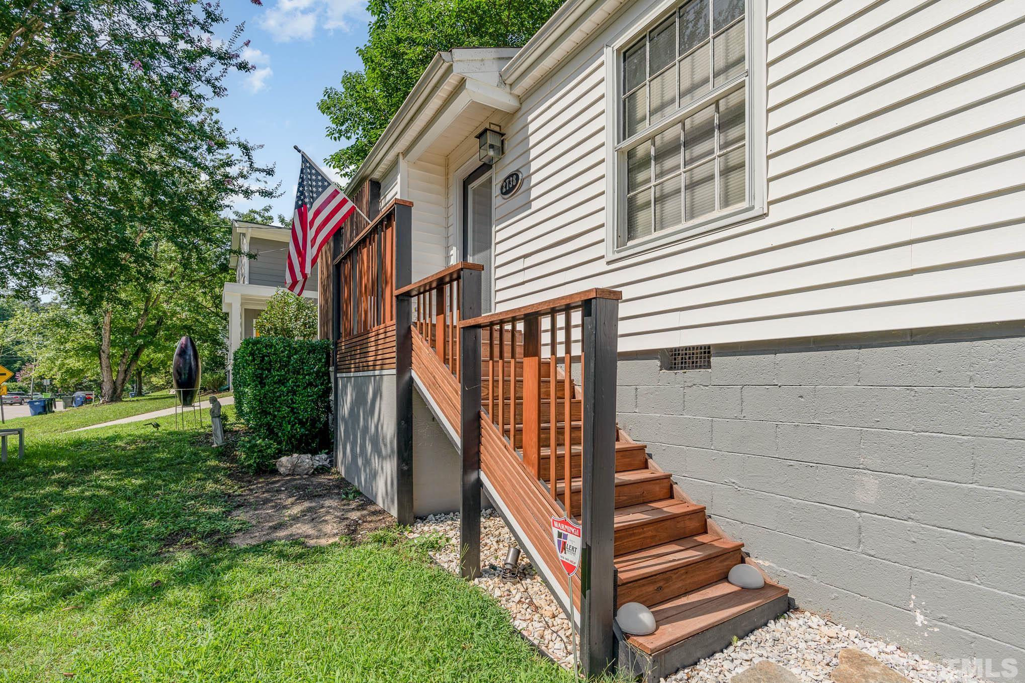 2738 Newbold Street Raleigh, NC 27603 - Photo 3 of 18 a view of a house with backyard and deck