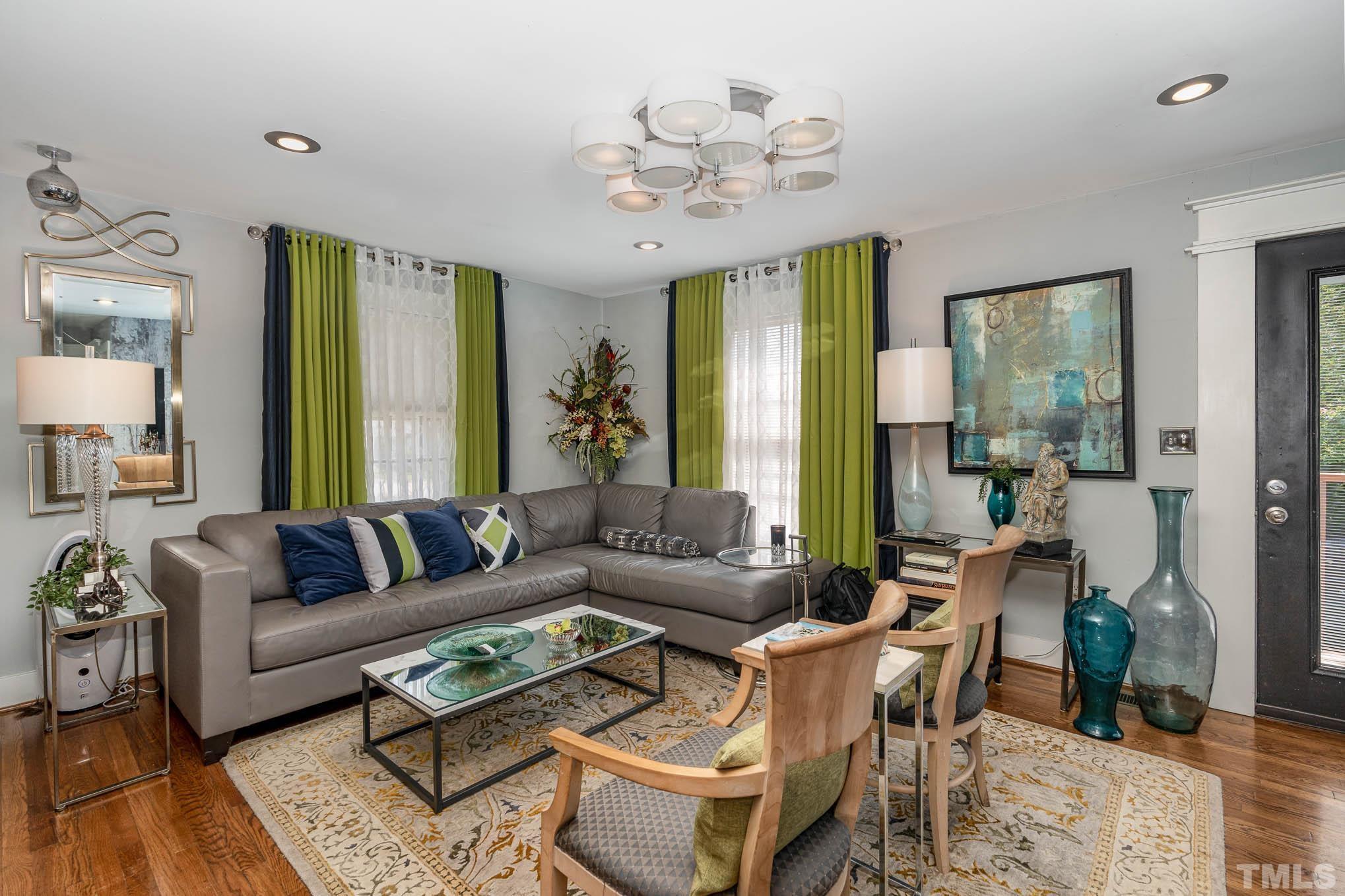 2738 Newbold Street Raleigh, NC 27603 - Photo 5 of 18 a living room with furniture and wooden floor