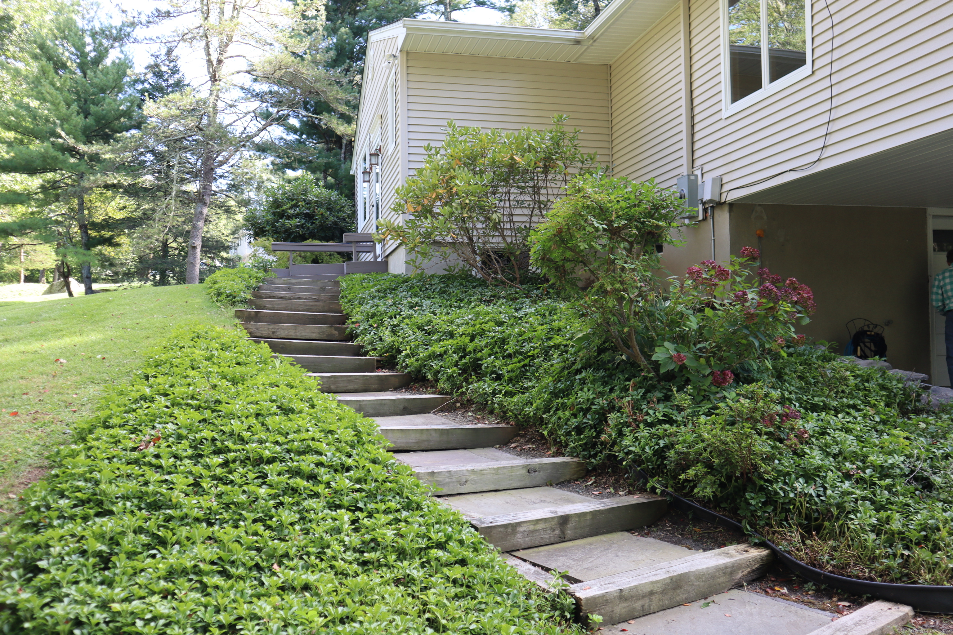 151 Chestnut Ridge Road Bethel, CT 06801 - Photo 3 of 23 a view of a garden with pathway