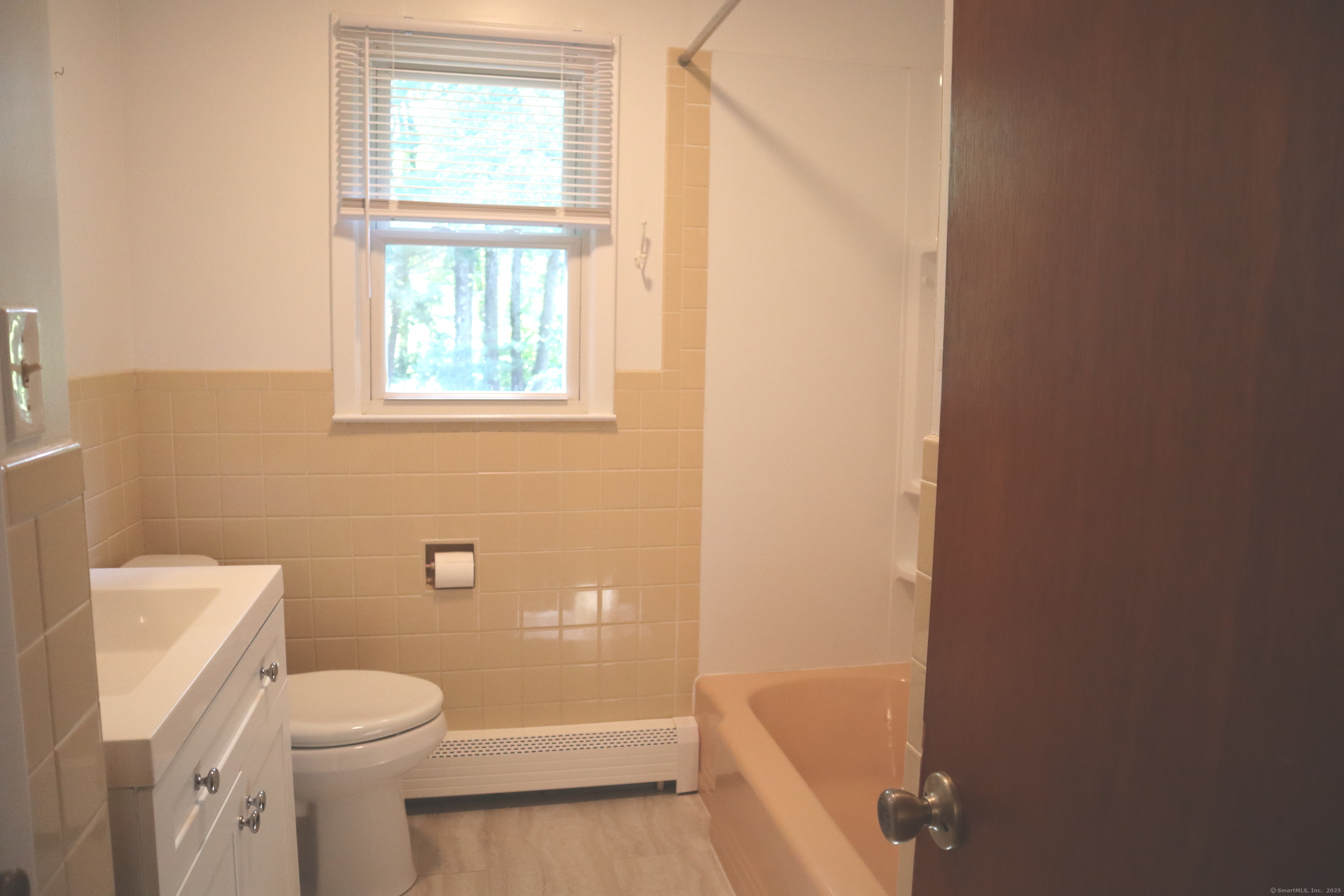 151 Chestnut Ridge Road Bethel, CT 06801 - Photo 10 of 23 a bathroom with a toilet and a shower