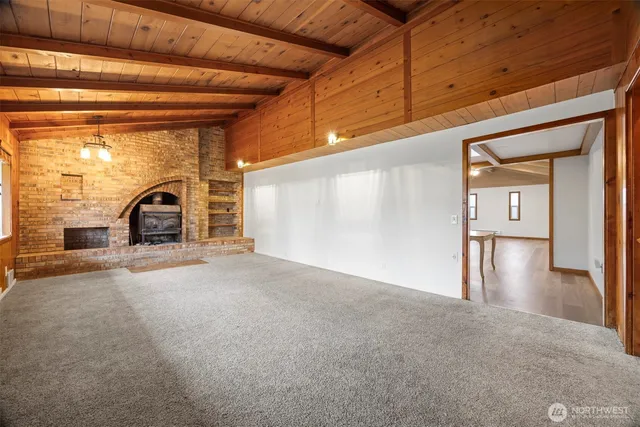 a view of a livingroom with a fireplace