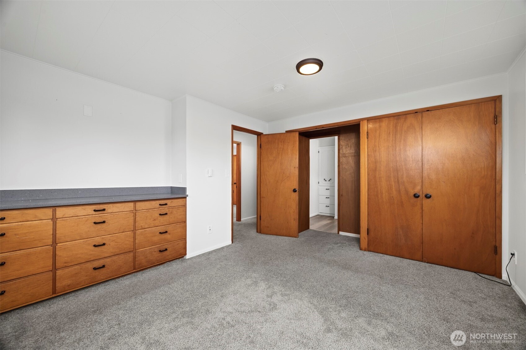 21275 Lafayette Road Sedro-Woolley, WA 98284 - Photo 16 of 40 a view of an empty room with cabinet and closet