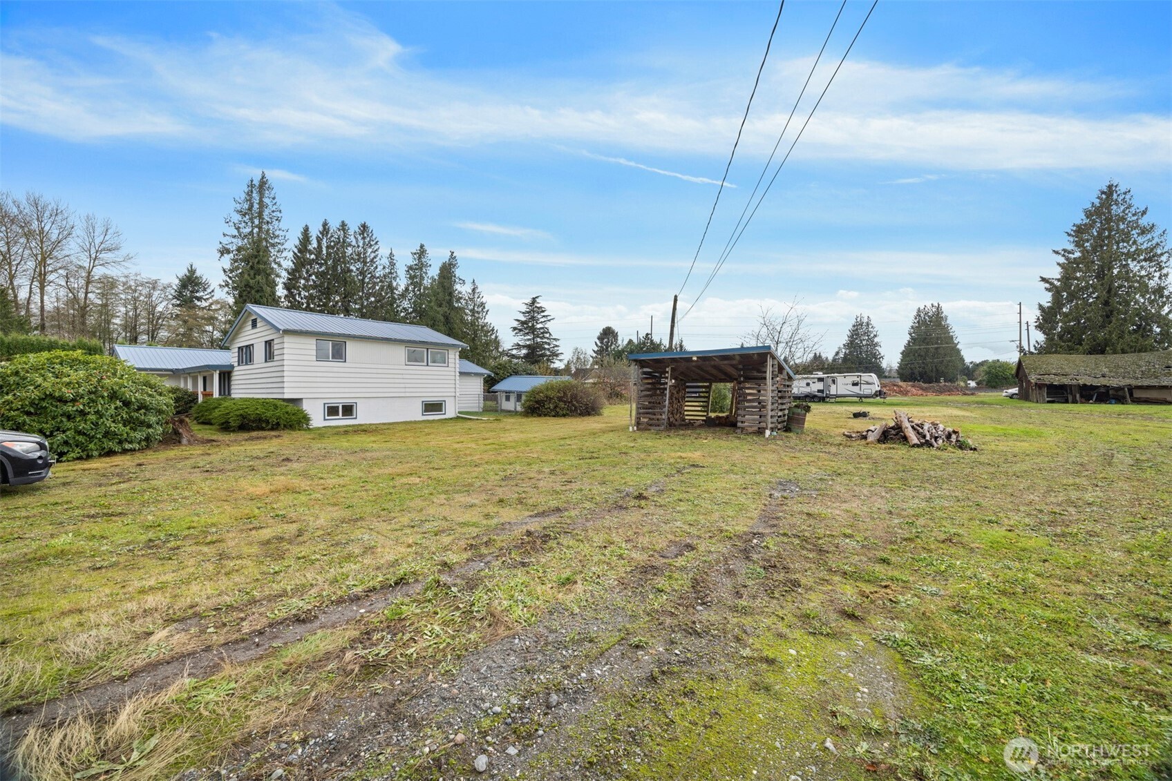21275 Lafayette Road Sedro-Woolley, WA 98284 - Photo 31 of 40 a car parked in front of house