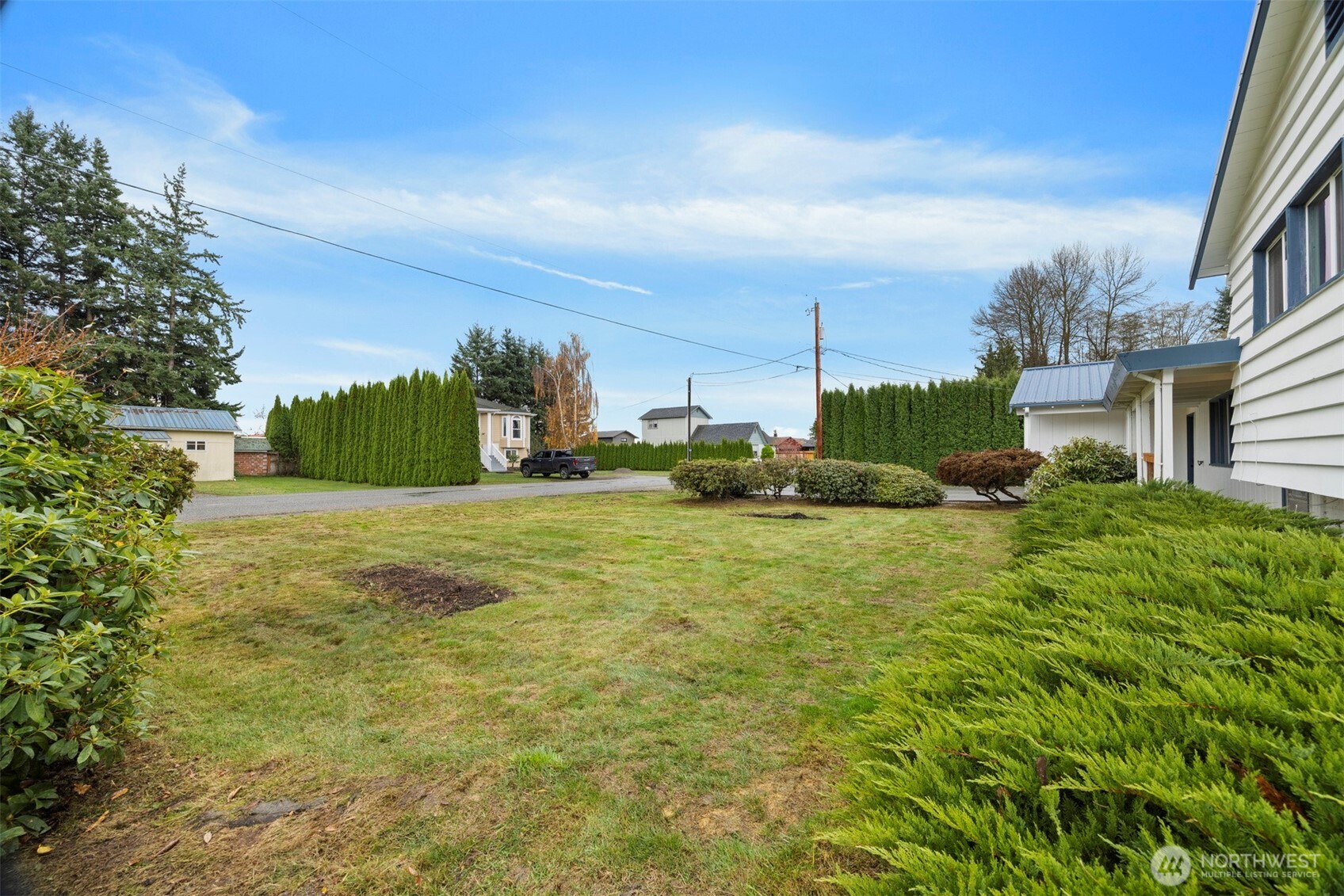 21275 Lafayette Road Sedro-Woolley, WA 98284 - Photo 32 of 40 a view of a street with houses