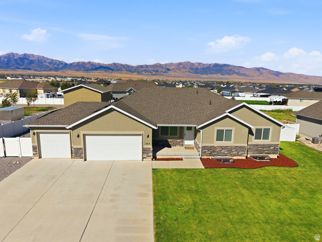 664 South Saddle Road Grantsville, UT 84029 - Photo 1 of 39 Rambler with 4+ garage, fully fenced and huge RV area!