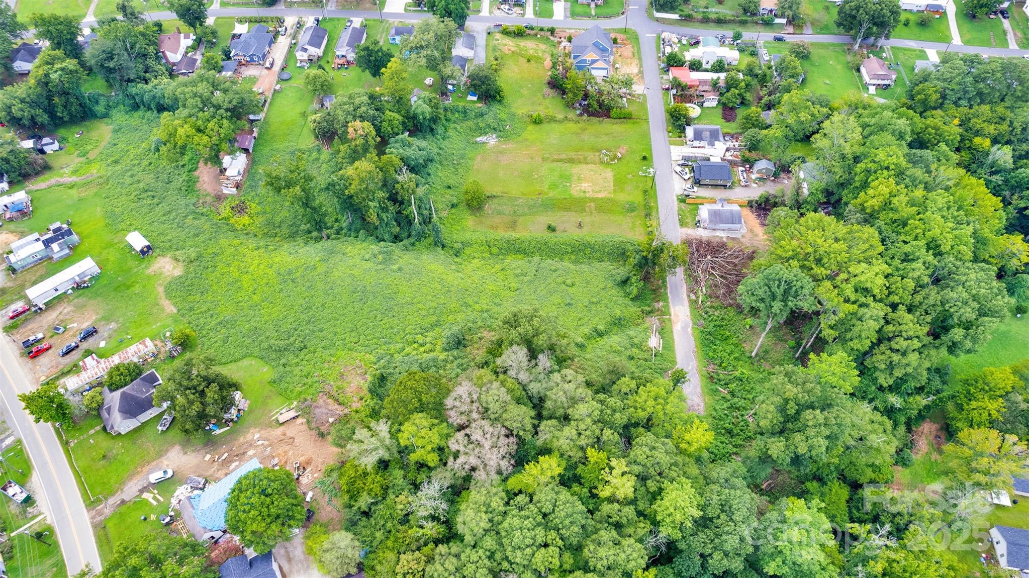 7 Bost Avenue Southwest Concord, NC 28027 - Photo 11 of 16 a view of a garden