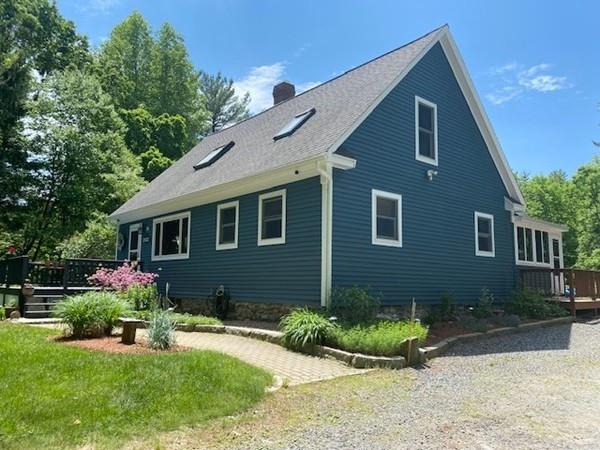 70 Cutler Road Holden, MA 01522 - Photo 1 of 28 a front view of a house with a yard