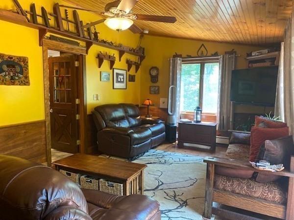 70 Cutler Road Holden, MA 01522 - Photo 16 of 28 a living room with furniture and a potted plant