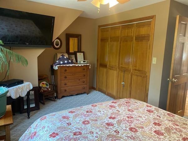 70 Cutler Road Holden, MA 01522 - Photo 23 of 28 a bedroom with a bed and a dresser