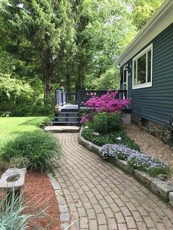 70 Cutler Road Holden, MA 01522 - Photo 3 of 28 a view of a backyard with sitting area