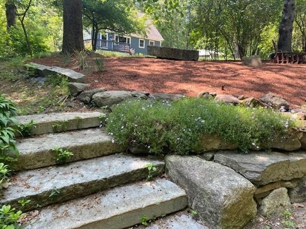 70 Cutler Road Holden, MA 01522 - Photo 4 of 28 a view of a backyard with green space