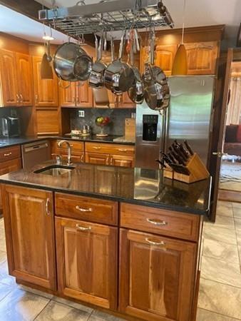 70 Cutler Road Holden, MA 01522 - Photo 10 of 28 a kitchen with stainless steel appliances granite countertop a sink and cabinets