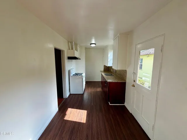 a view of entryway with wooden floor
