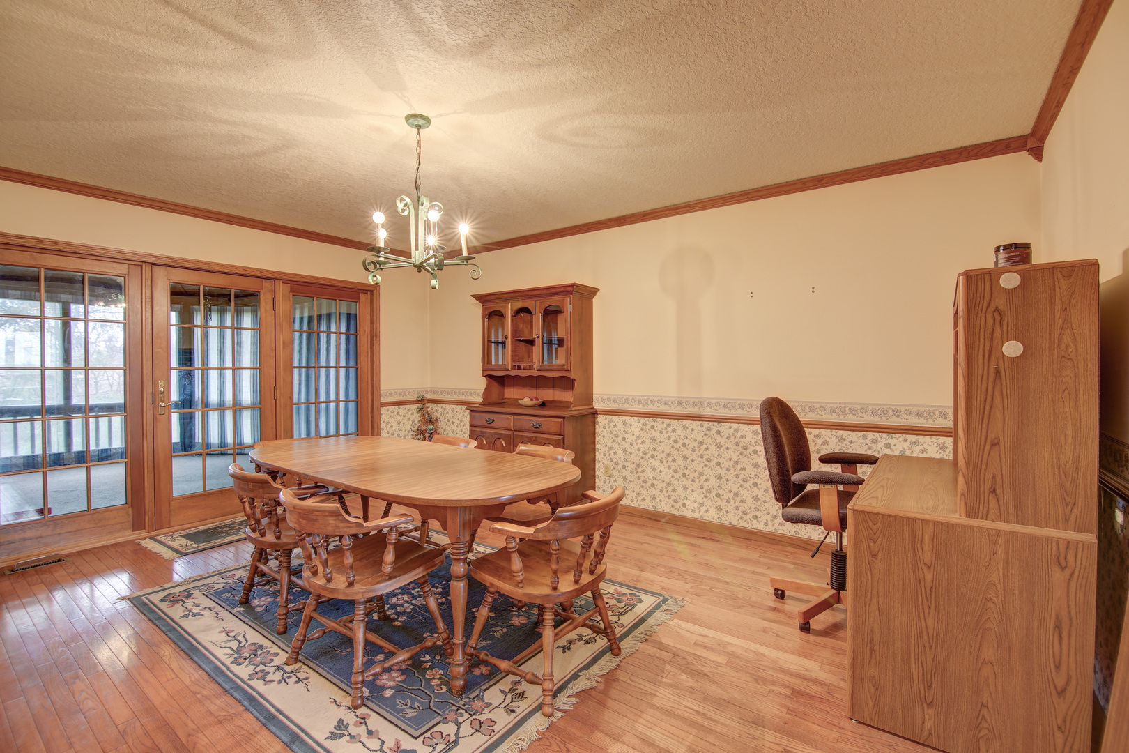 13564 Damen Road Morrison, IL 61270 - Photo 6 of 37 a view of a dining room with furniture and wooden floor