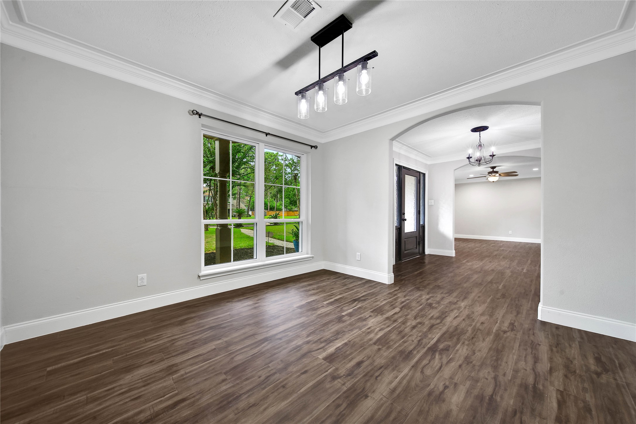 6407 Craigway Road Spring, TX 77389 - Photo 12 of 47 On the other side of the kitchen you’ll find the formal dining room. Two entrances make it easy to entertain in this space.