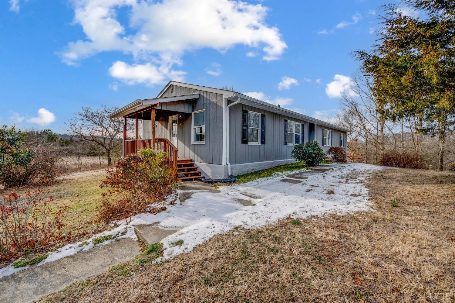 1784 Lukin Road Pamplin, VA 23958 - Photo 9 of 31 a front view of a house with a yard