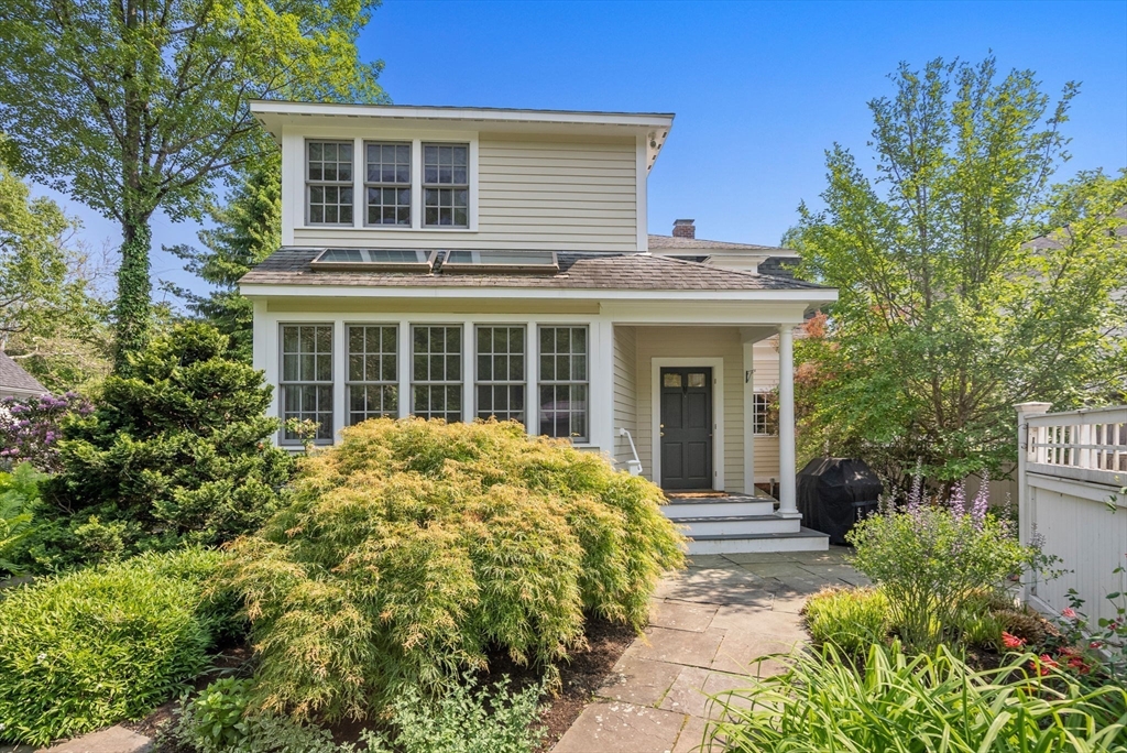 647 Boston Post Road Weston, MA 02493 - Photo 2 of 30 a house view with a garden space