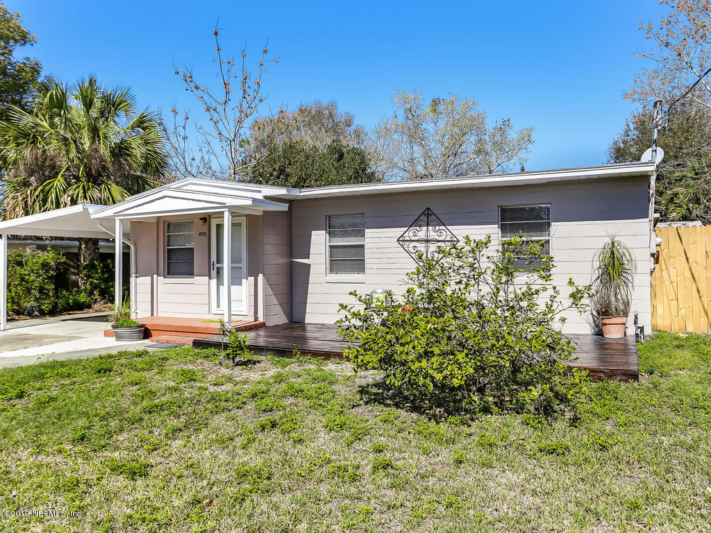 6723 Ector Road Jacksonville, FL 32211 - Photo 3 of 43 a front view of a house with a yard