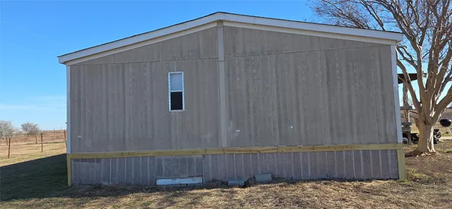 a bedroom with a bed and furniture