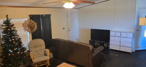 a kitchen that has a stove and a table